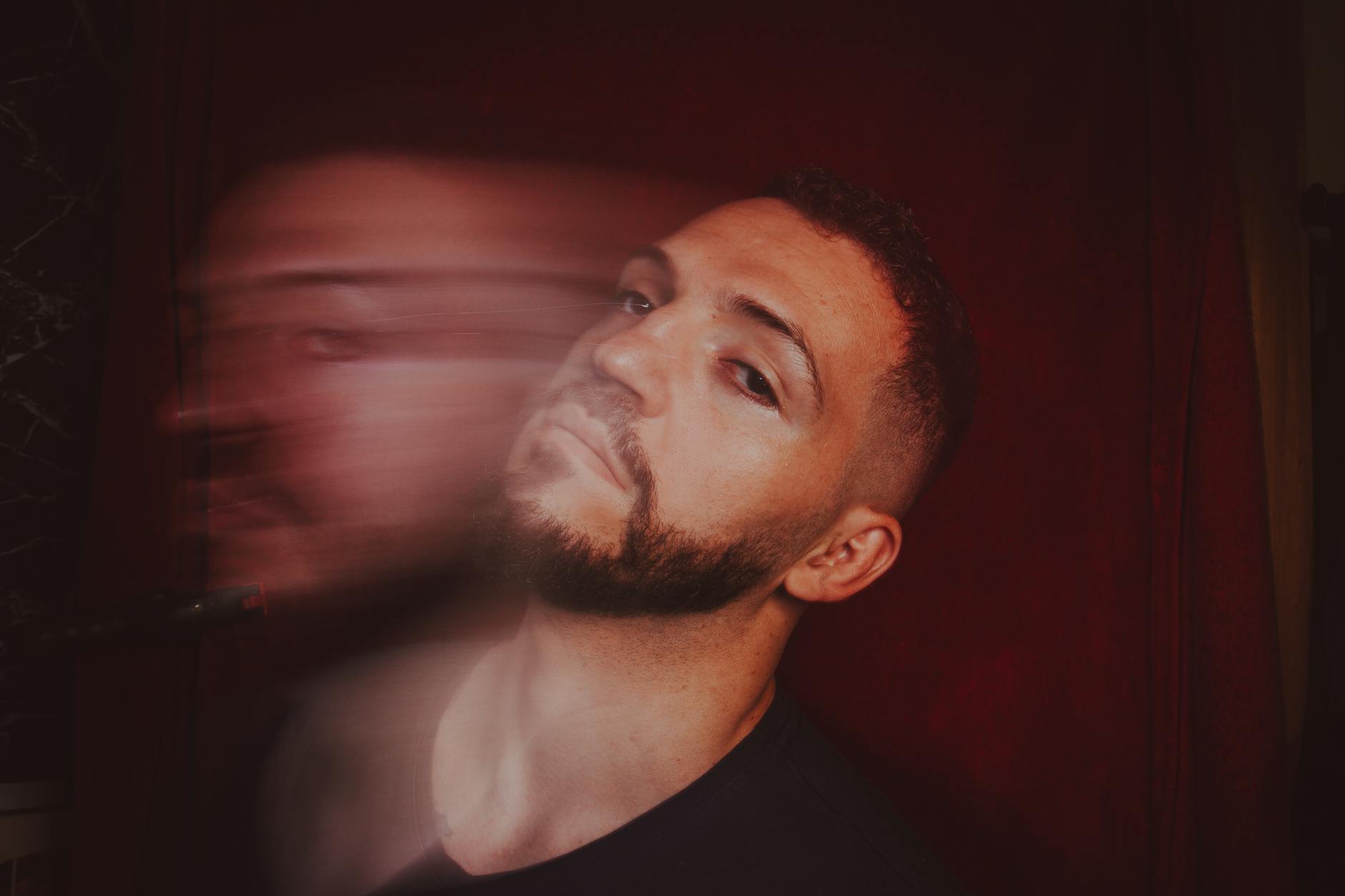 A creative portrait showcasing a unique motion blur effect in warm tones. -- pijushsaha.com