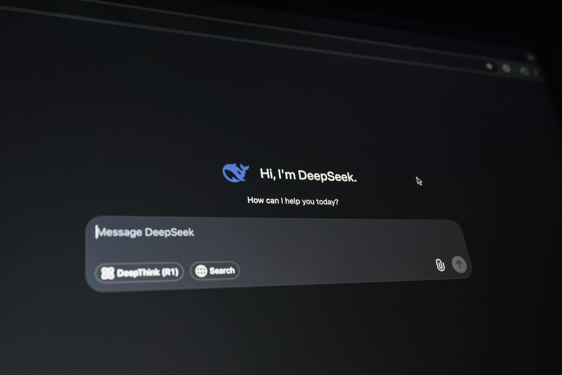 Close-up of a digital assistant interface on a dark screen, showcasing AI technology communication. — pijushsaha.com