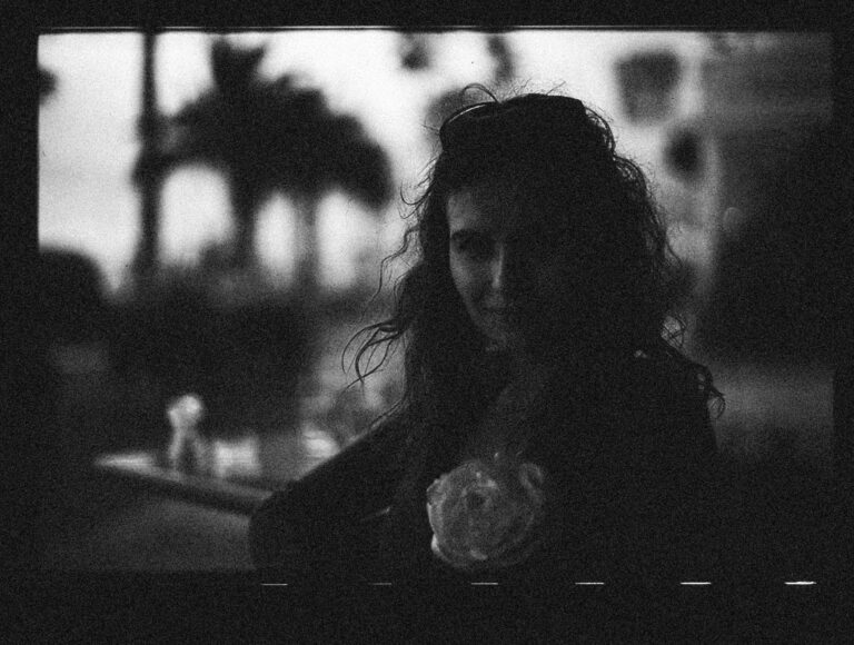 Artistic black and white silhouette of a woman in an outdoor setting. -- pijushsaha.com